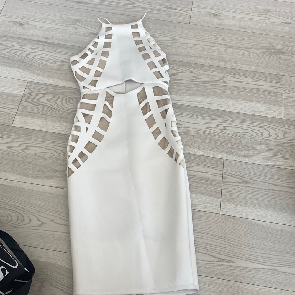 knee length white cut out dress with chest coverage